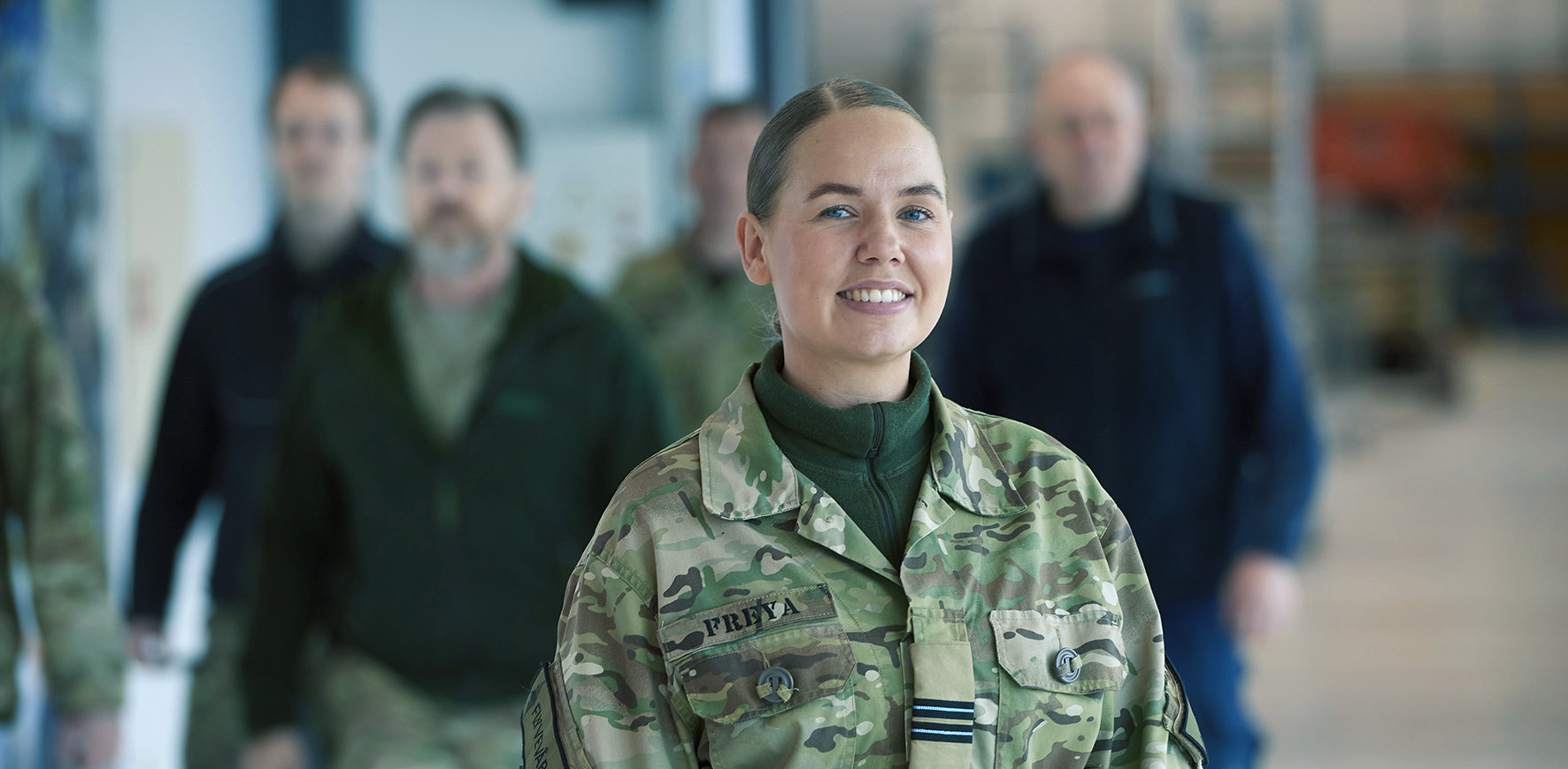 picture of a woman in a military suit
